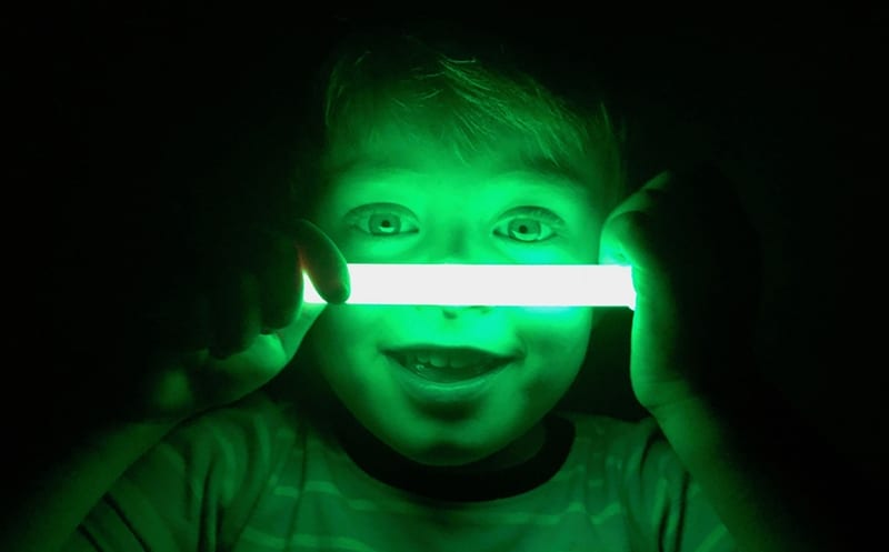 Child with glow stick